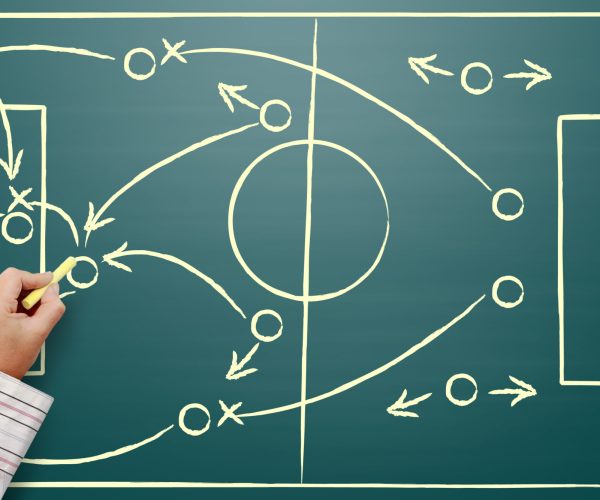 cropped-hand-person-writing-blackboard